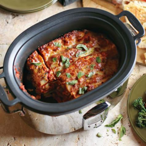 Slow Cooker Barbacoa Brisket This slow cooker version replicates the flavors and a bit of that traditional method: Chipotle chiles, ground cumin, and oregano offer bold, smoky flavor, and the beef brisket steams to tenderness as it cooks gently in the slow cooker.