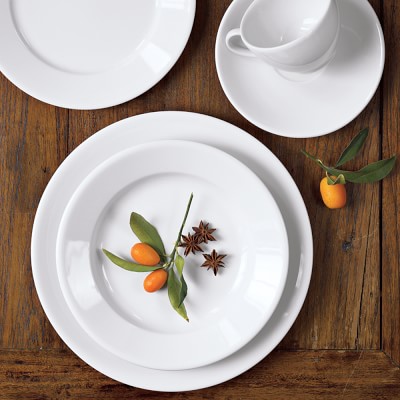Apilco Tradition Porcelain Dinnerware Sets 20-piece place setting includes 4 of each: dinner plate, salad plate, soup bowl, teacup and saucer.